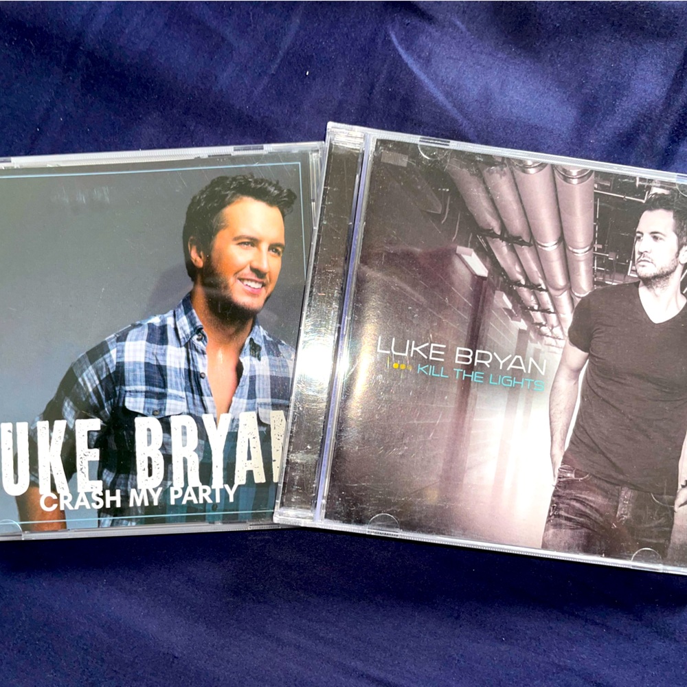 Two Luke Bryan CDs